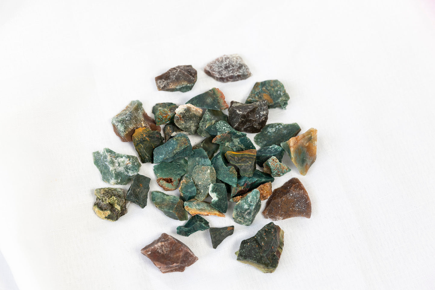 Collection of rough stones on a white background