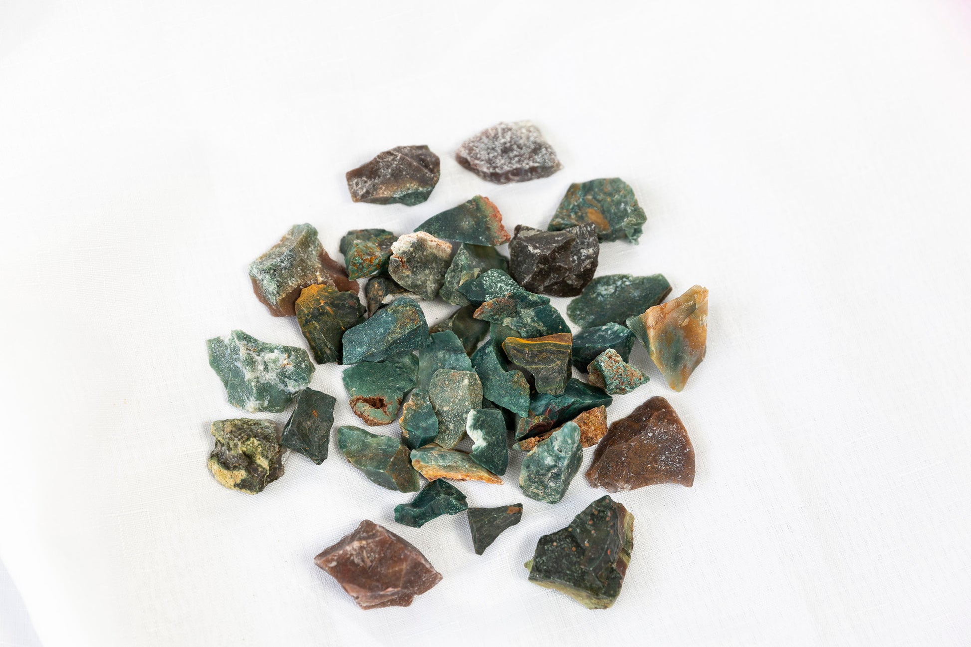 Collection of rough stones on a white background